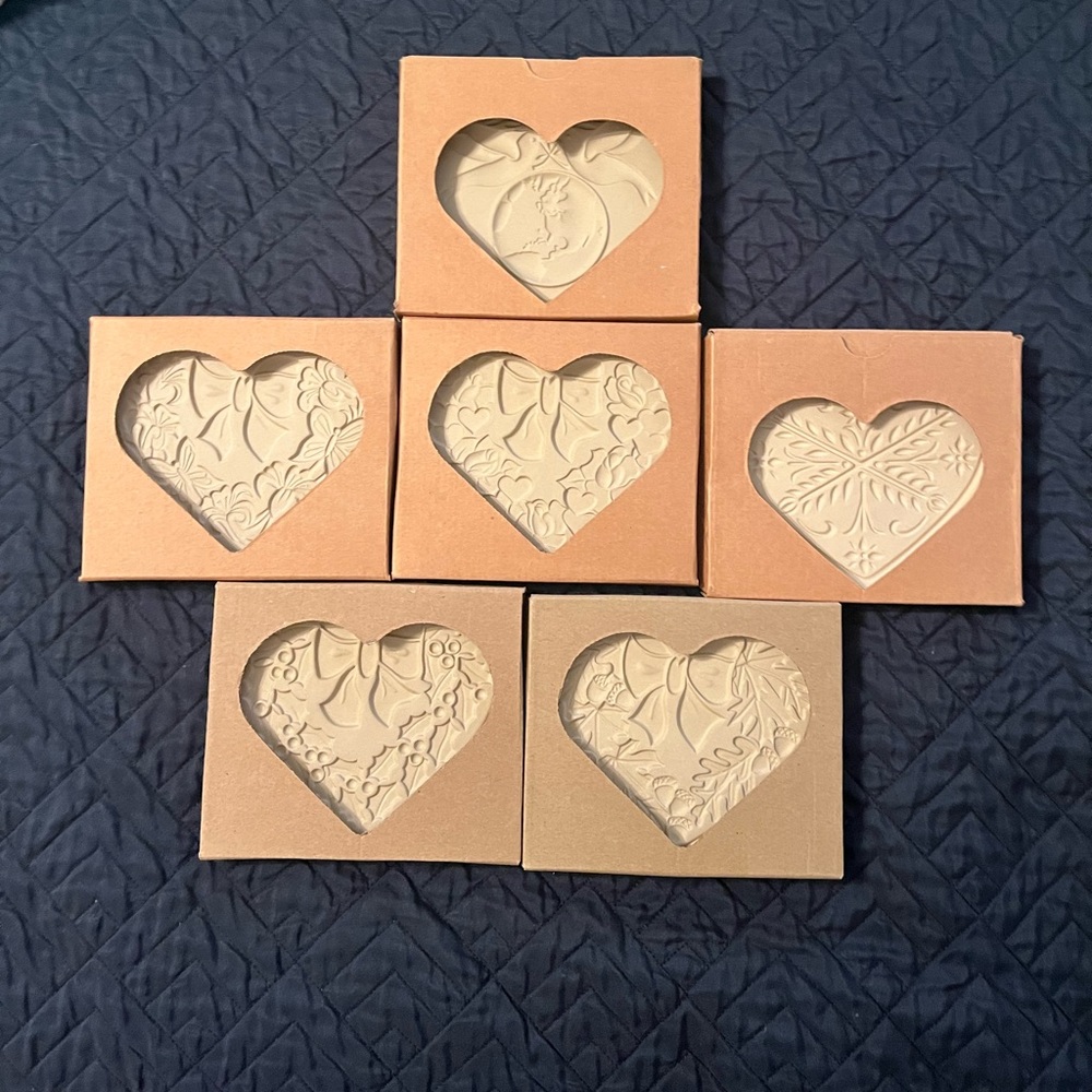NIB pampered chef stoneware cookie molds.